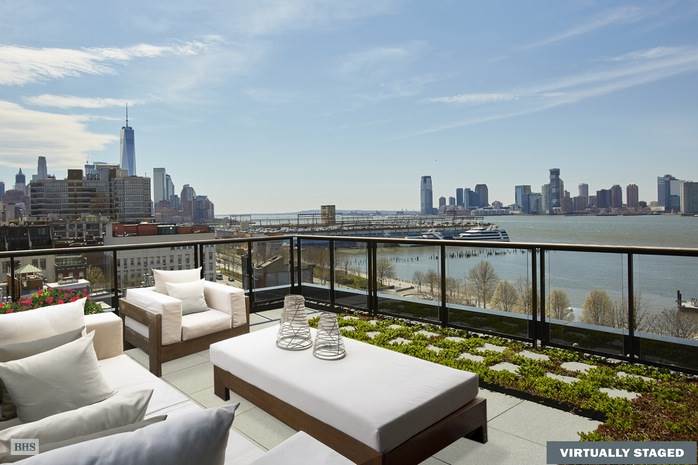 rooftop patio area with furnitue