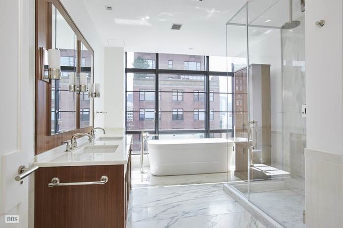 large bathroom with freestanding tub