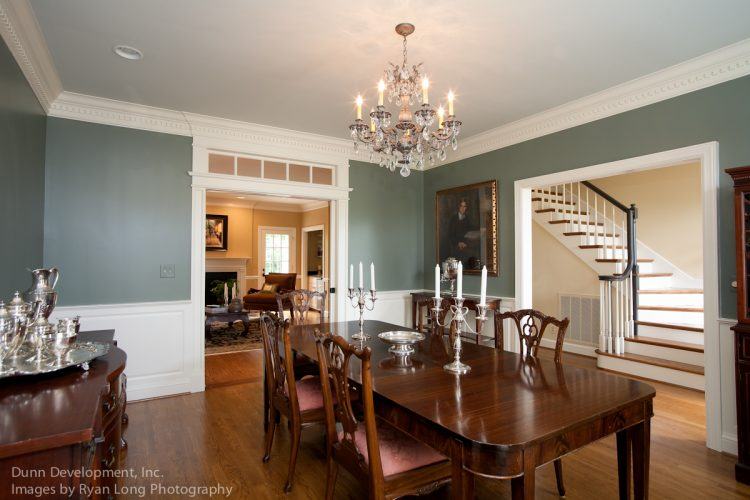 simple dining room with chandelier 