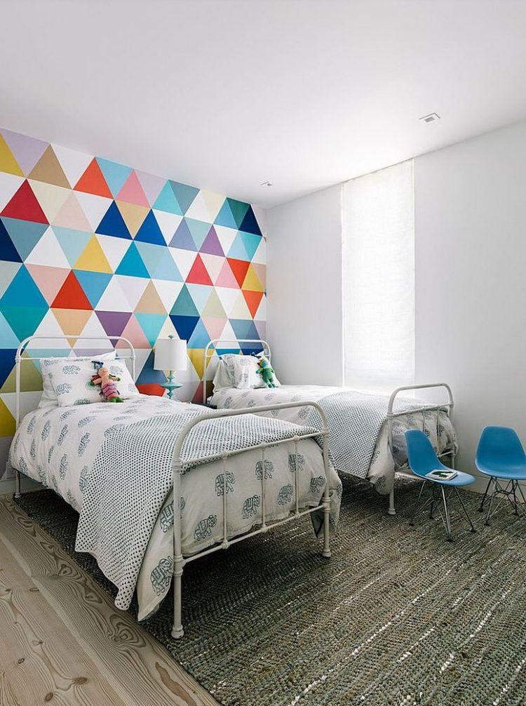 kids bedroom with colorful accent wall