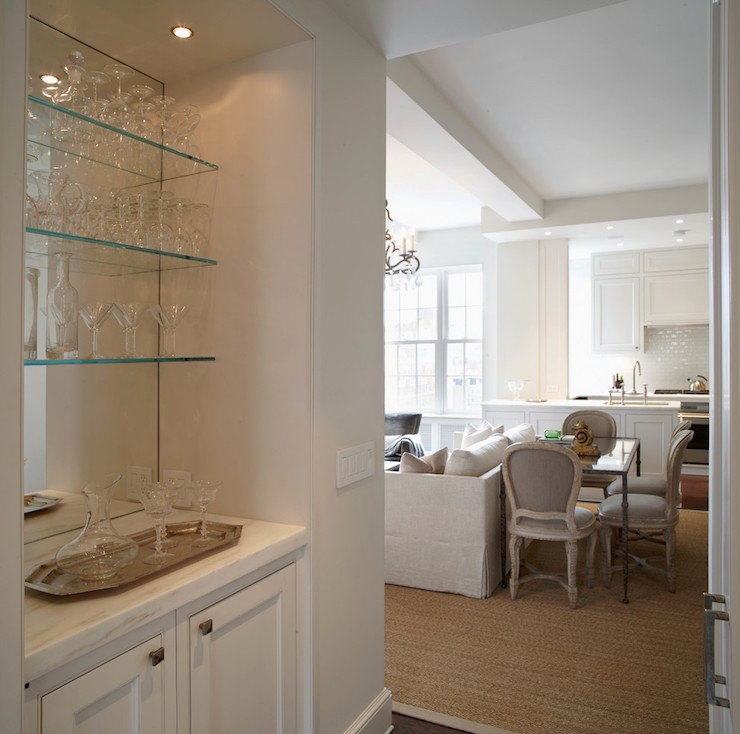 bar area with glass shelving