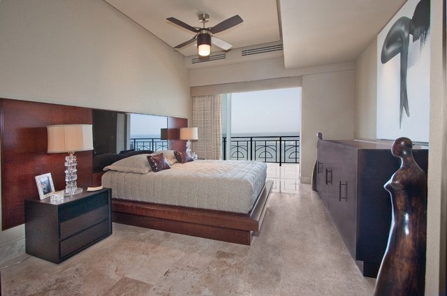 bedroom with marble floor and balcony