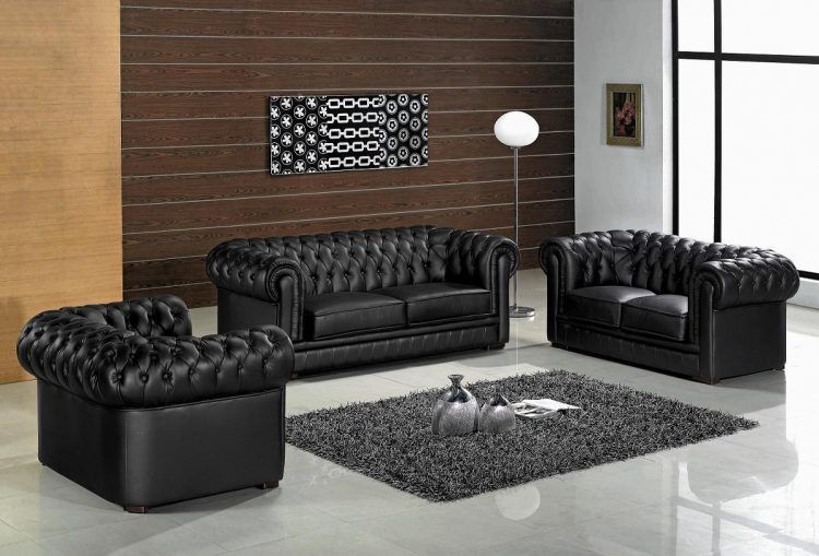 living room with three leather sofas