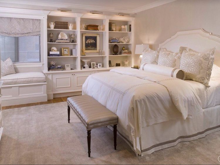 master bedroom with upholstered bench