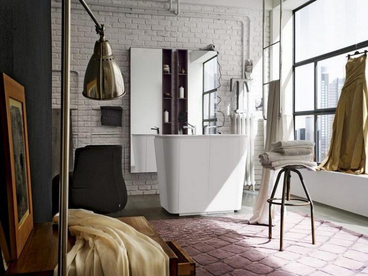 trendy bathroom with white brick wall