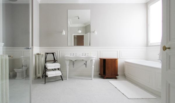 all white bathroom with wooden accent