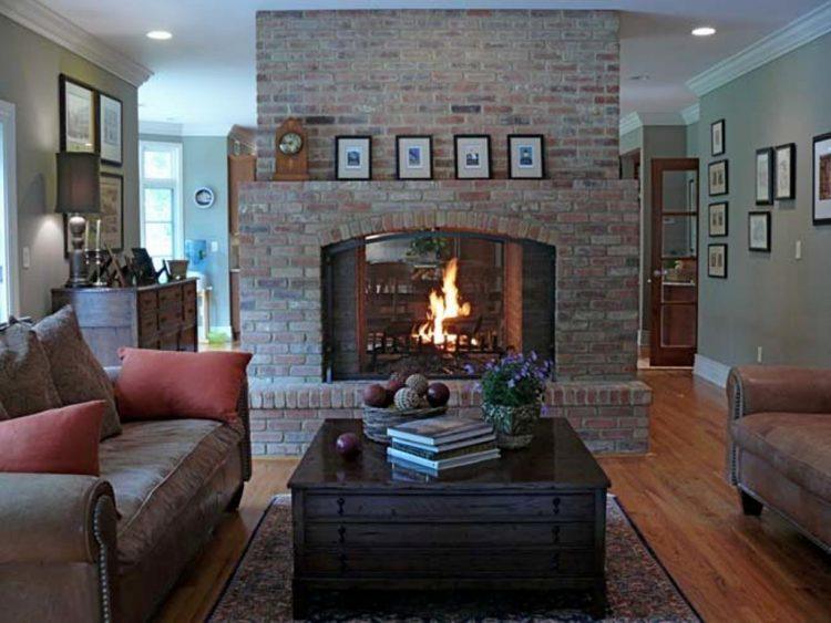 country living room with large brick fireplace