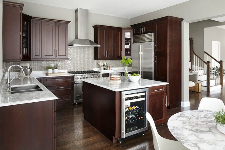 kitchen with wood floors and small wine fridge