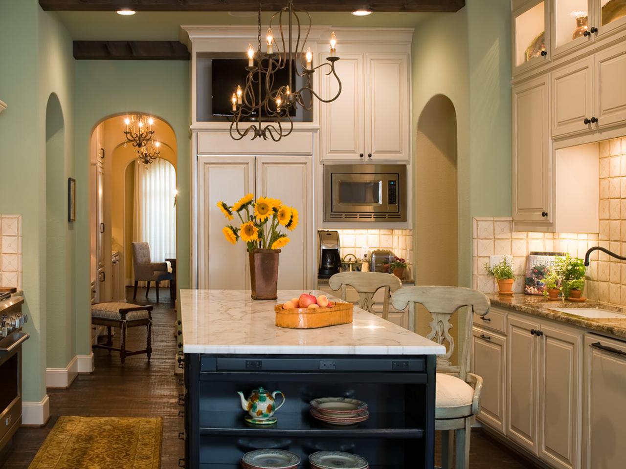 black kitchen cabinet and pale green wall