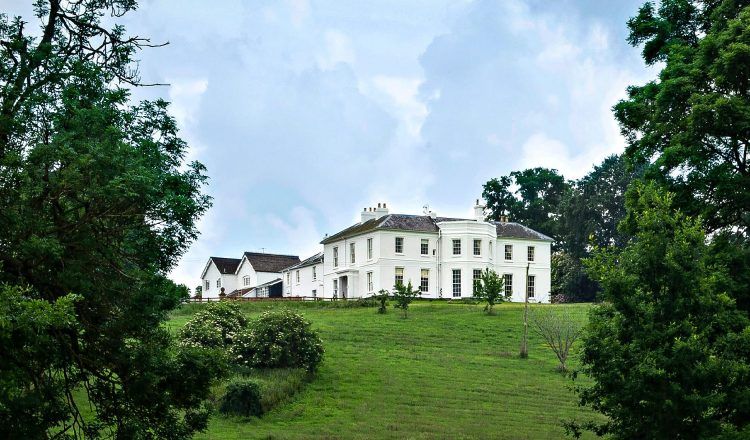 exterior of white country home