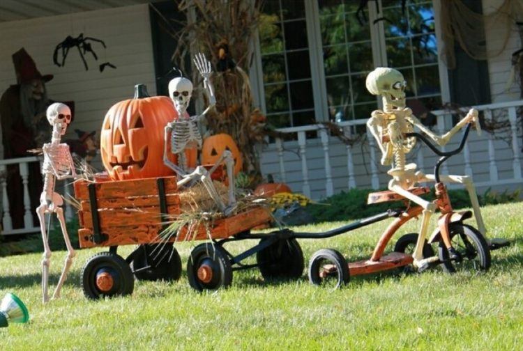 halloween yard decorations with pumpkin and skeleton