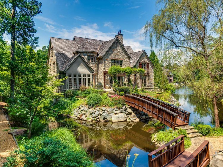 country home with pond