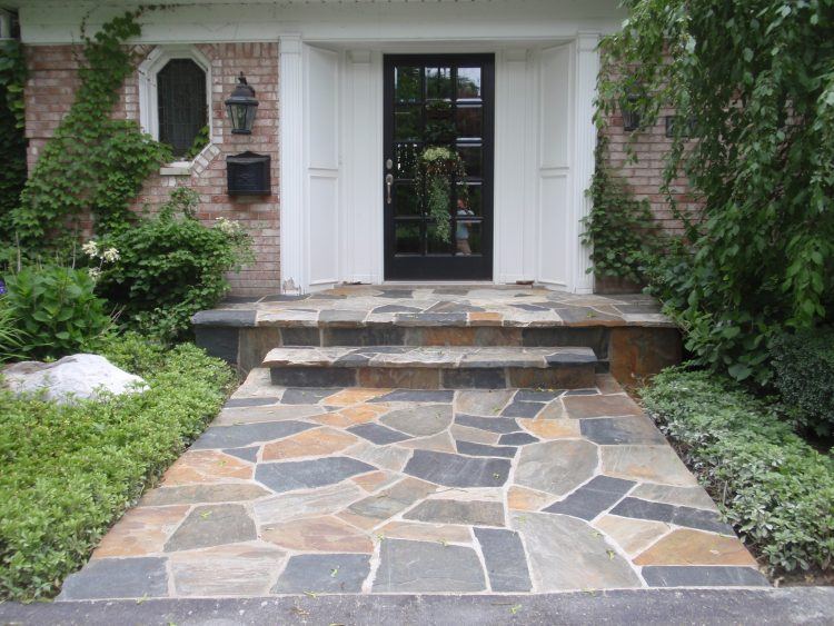 beautiful stone walk way and porch