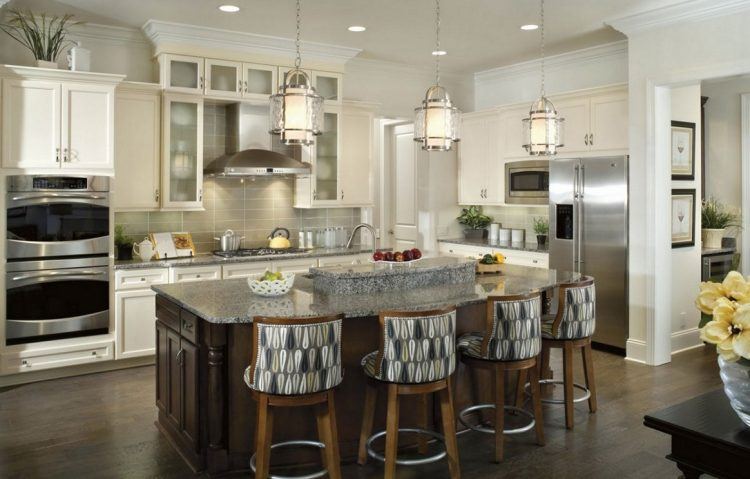 kitchen island with hanging lamps