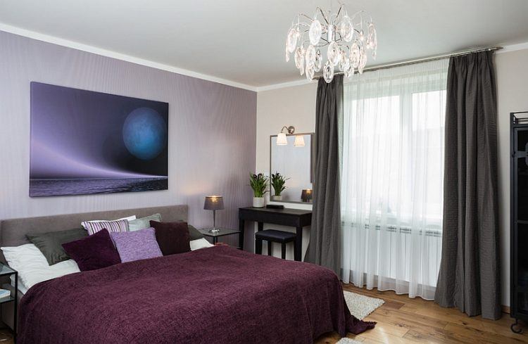 sleek modern bedroom with crystal chandelier