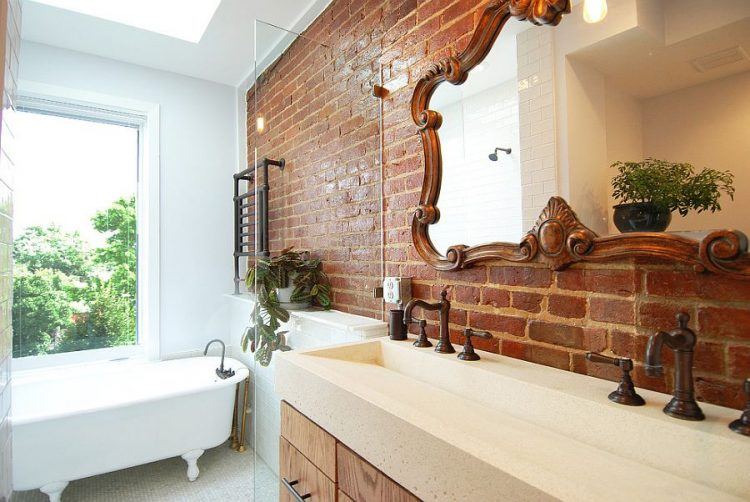 large bathroom with beautiful brick wall