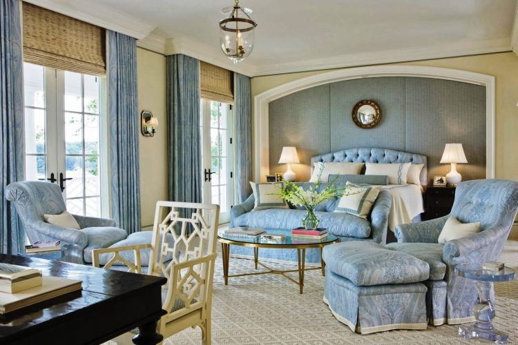 beautiful large bedroom with blue furniture