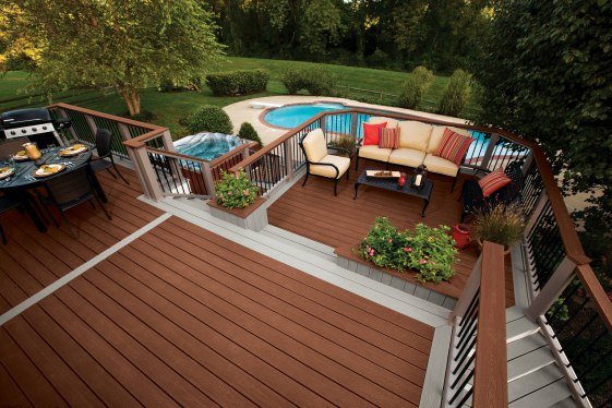 attractive wooden deck overlooking pool