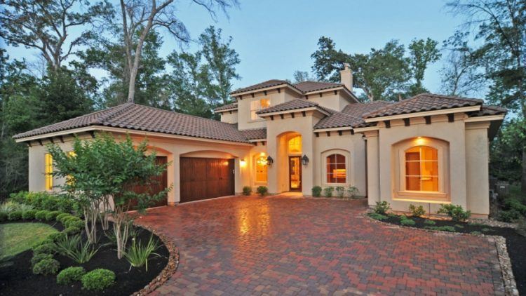 lavish house with beautiful brick driveway