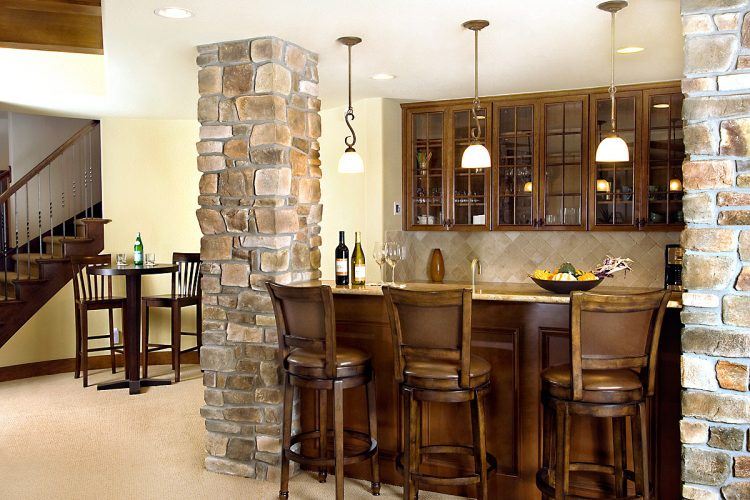 awesome basement bar with stone pillar