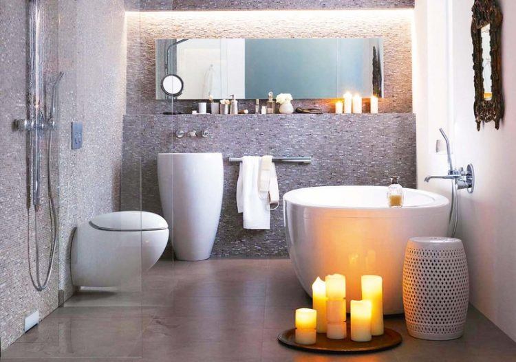 small bathroom with round tub and long mirror