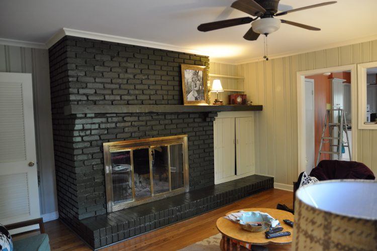 painted black brick fireplace