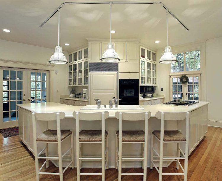 kitchen breakfast bar with pendant lights