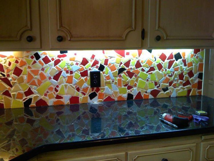 kitchen back splash with broken tile