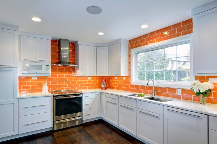 small kitchen orange wall