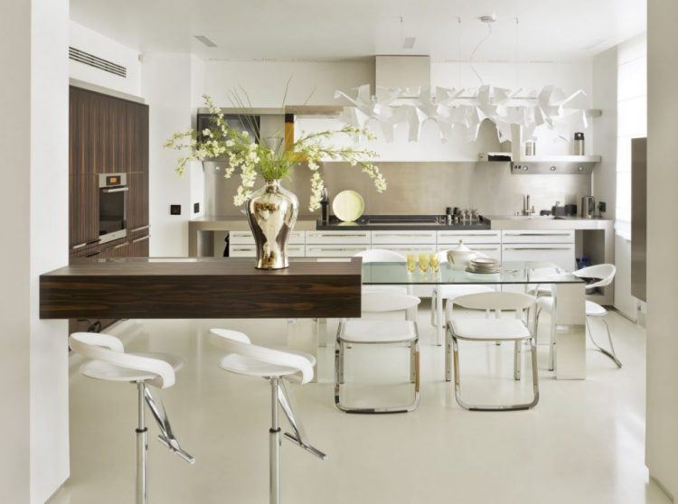 modern kitchen with glass dining table