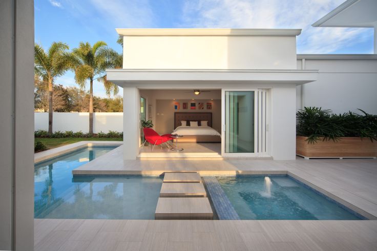 bedroom with outdoor pool