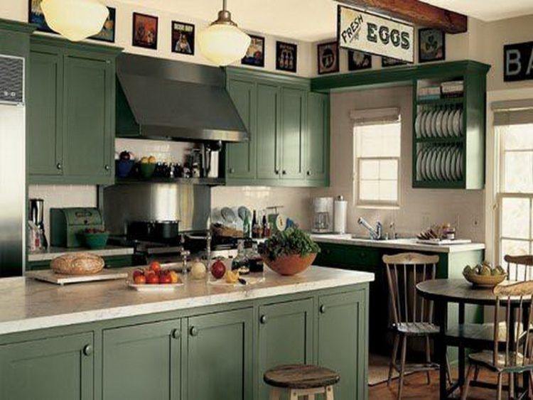 beautiful kitchen with green cabinets