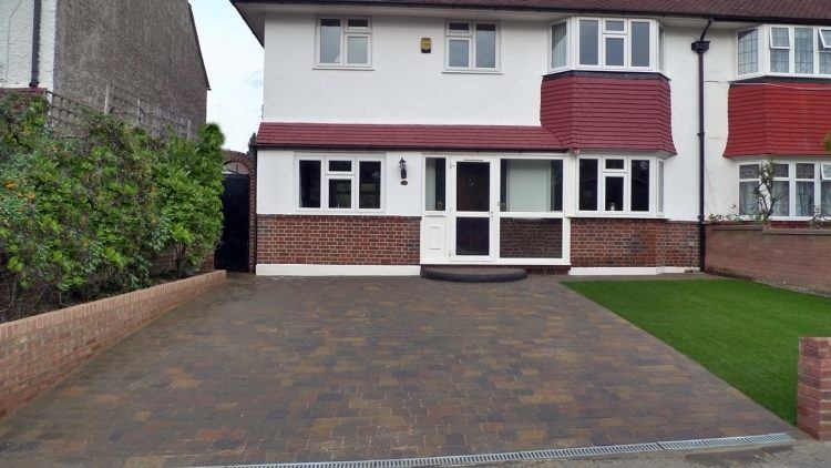 home in loon with brick driveway