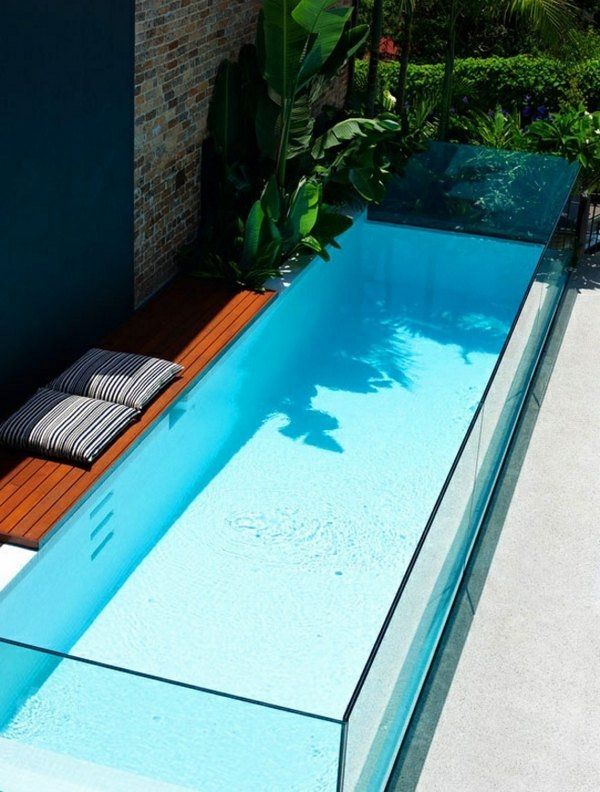 glass pool with wooden deck