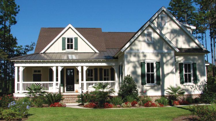 country home with manicured lawn