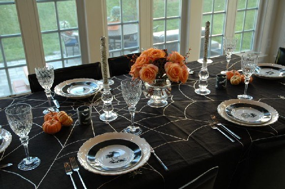 table with spider web table cloth