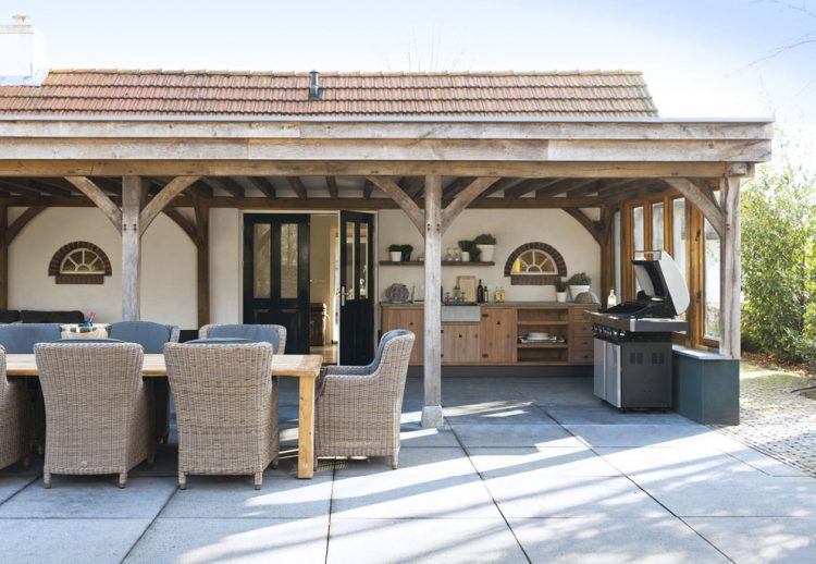 covered patio design with grill