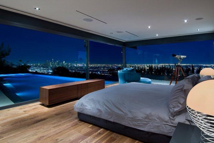 bedroom with pool at night