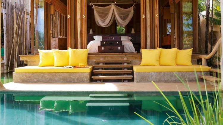 pool villa with yellow pillows