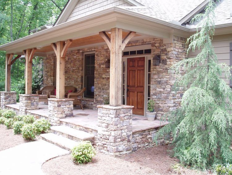 stacked stone front porch on cabin style house