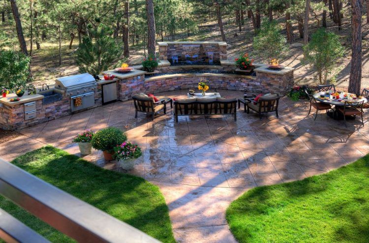 stunning stamped concrete patio with furniture