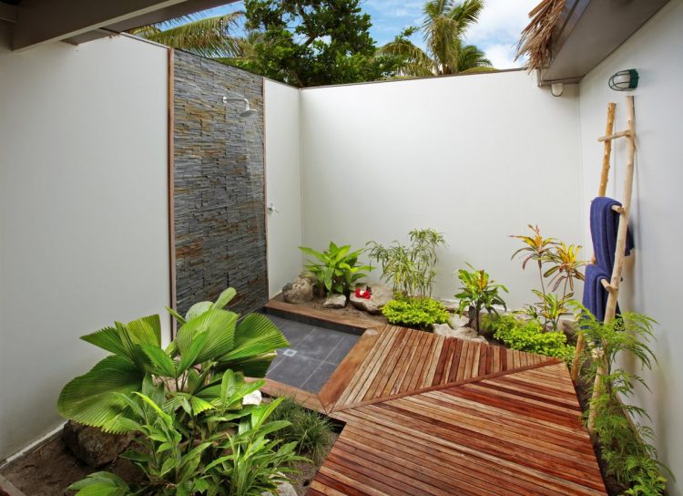 beautiful modern outdoor shower with wood floor