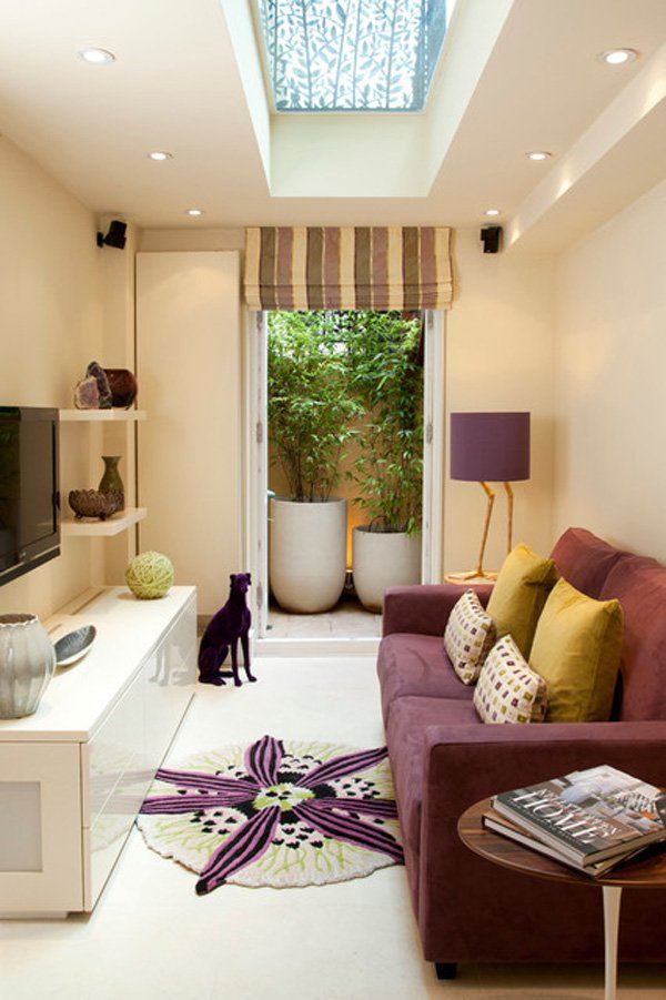 living room with purple furniture