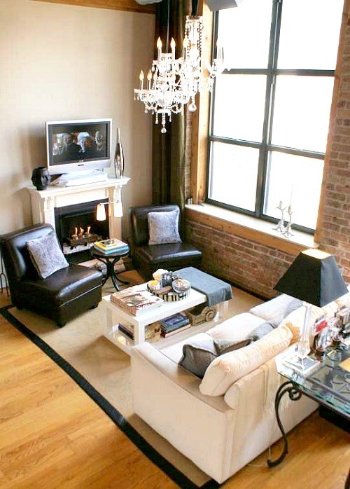 contemporary living room with chandelier