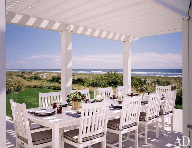 all white outdoor dining space