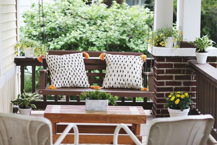 beautiful front porch with swings