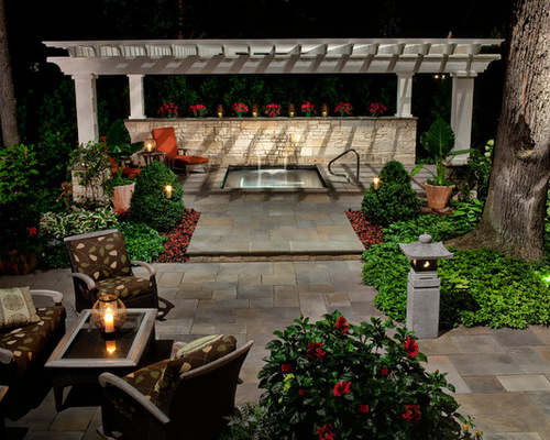 beautiful hot tub with traditional patio