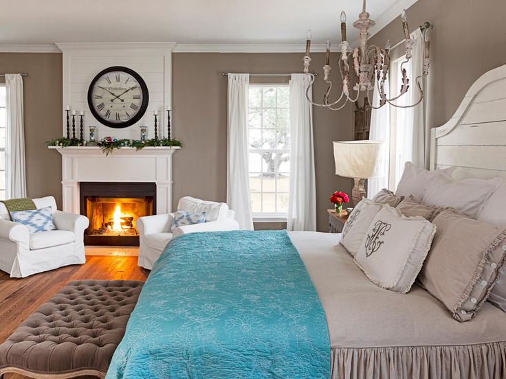 bedroom with stunning white fireplace