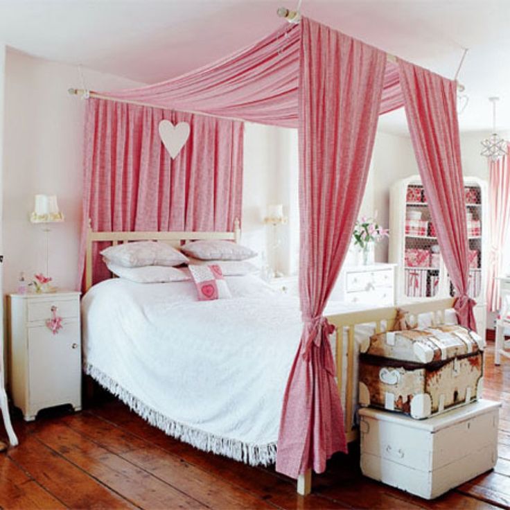 beautiful pink canopy bed for girl's room