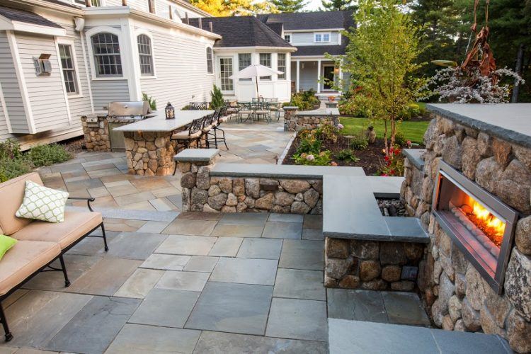 stone patio with brick ledge